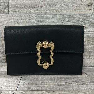 Black vegan gold snake hardware belt bag